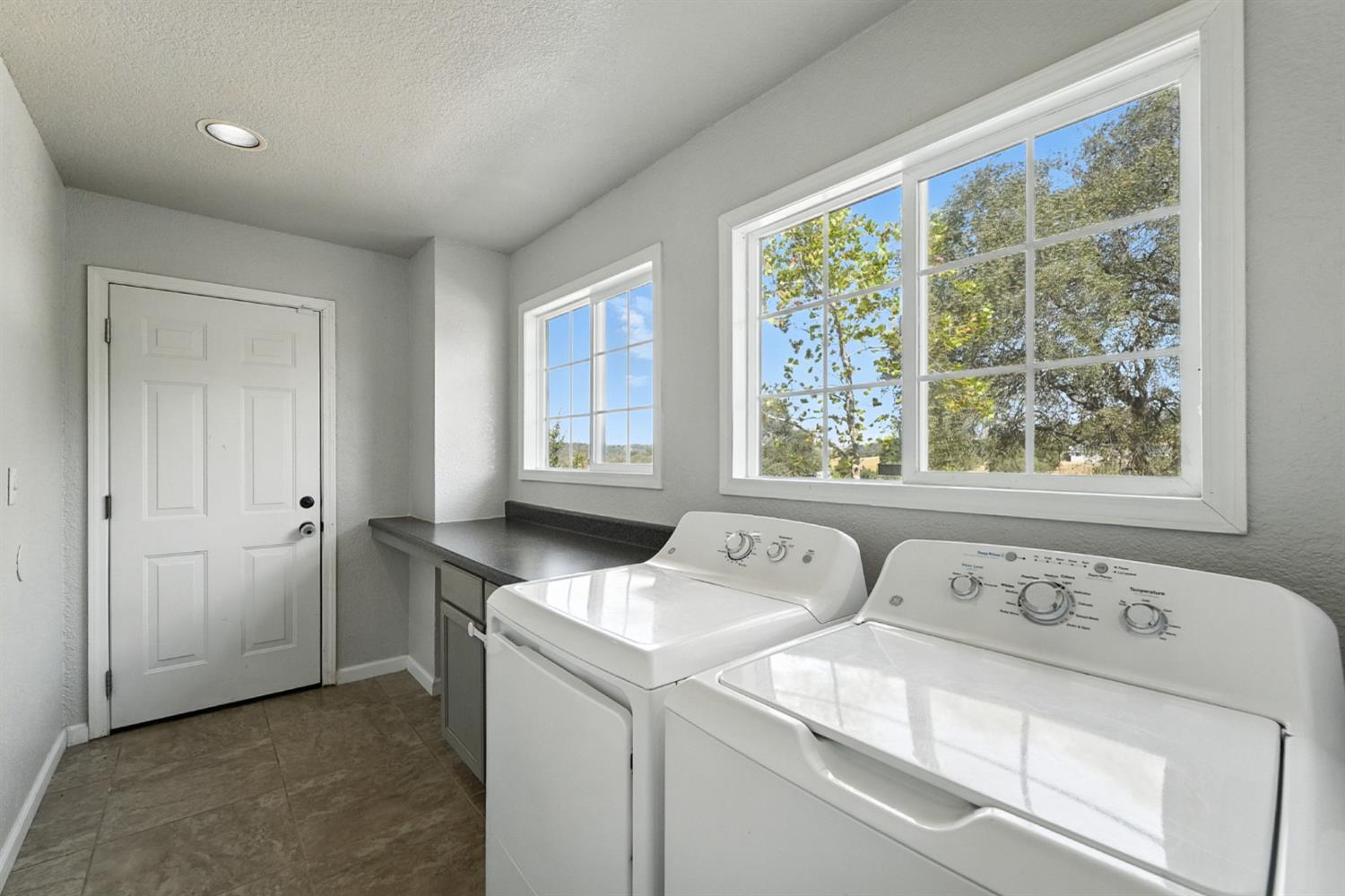 2422 Cheyenne Road Copperopolis, CA 95228 - Photo 21 of 64 a utility room with dryer and washer
