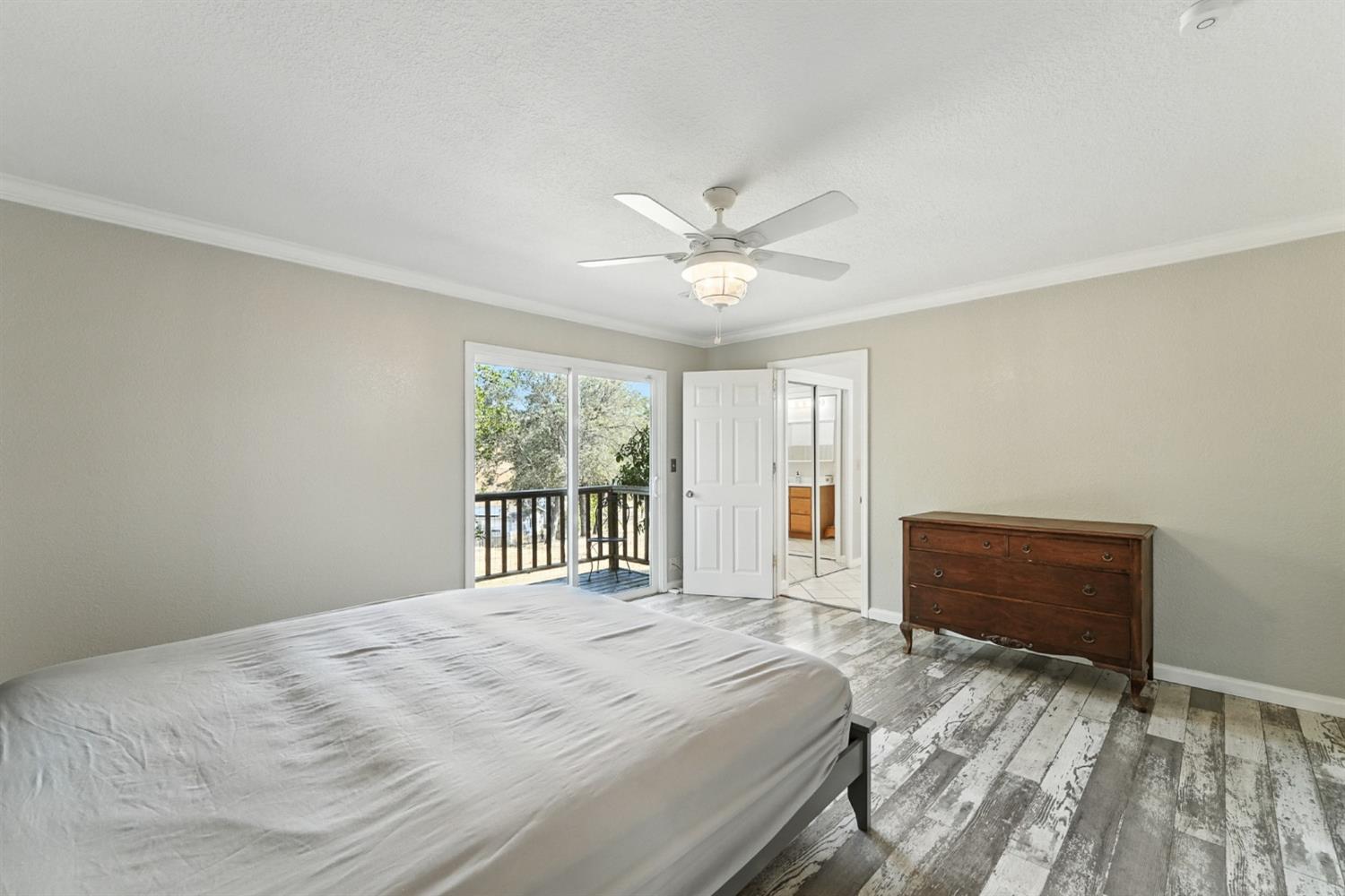 2422 Cheyenne Road Copperopolis, CA 95228 - Photo 23 of 64 a bedroom with a large bed and a window