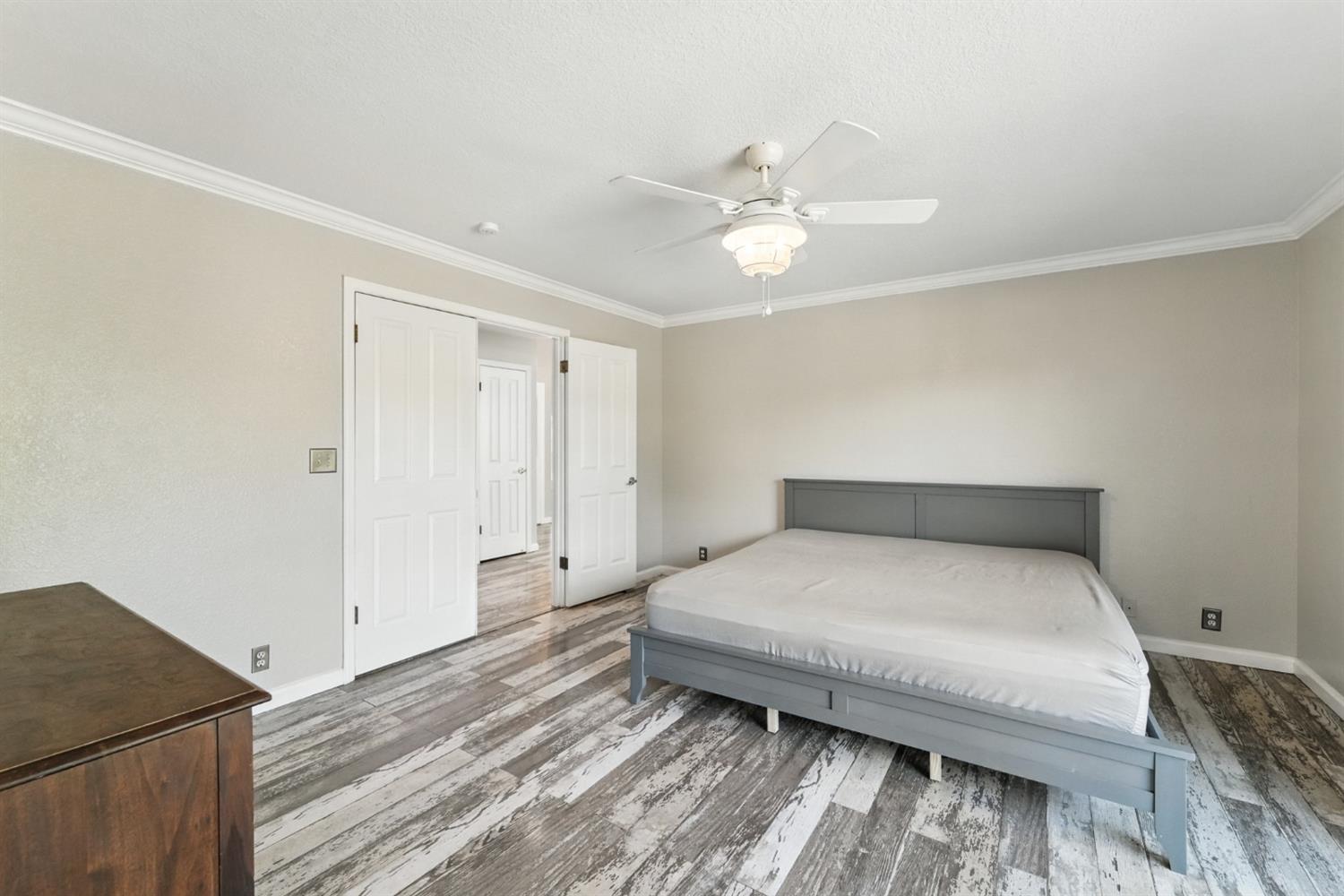 2422 Cheyenne Road Copperopolis, CA 95228 - Photo 26 of 64 a bedroom with a bed and a dresser