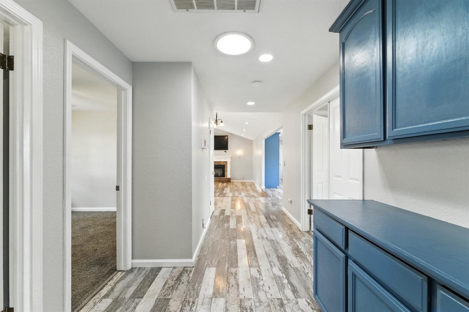 2422 Cheyenne Road Copperopolis, CA 95228 - Photo 37 of 64 a view of a kitchen with wooden floor and staircase