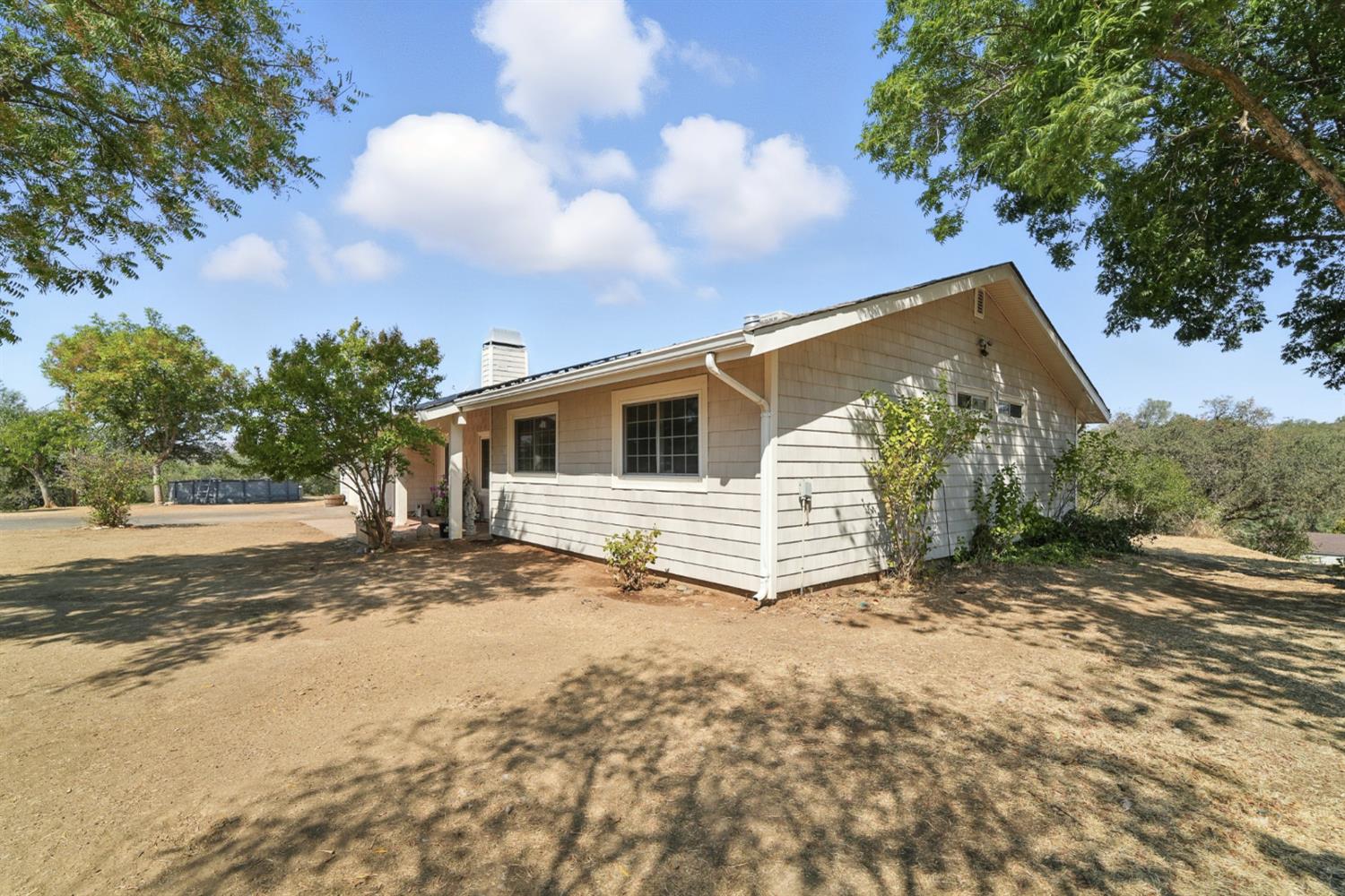 2422 Cheyenne Road Copperopolis, CA 95228 - Photo 4 of 64 a view of a house with a yard