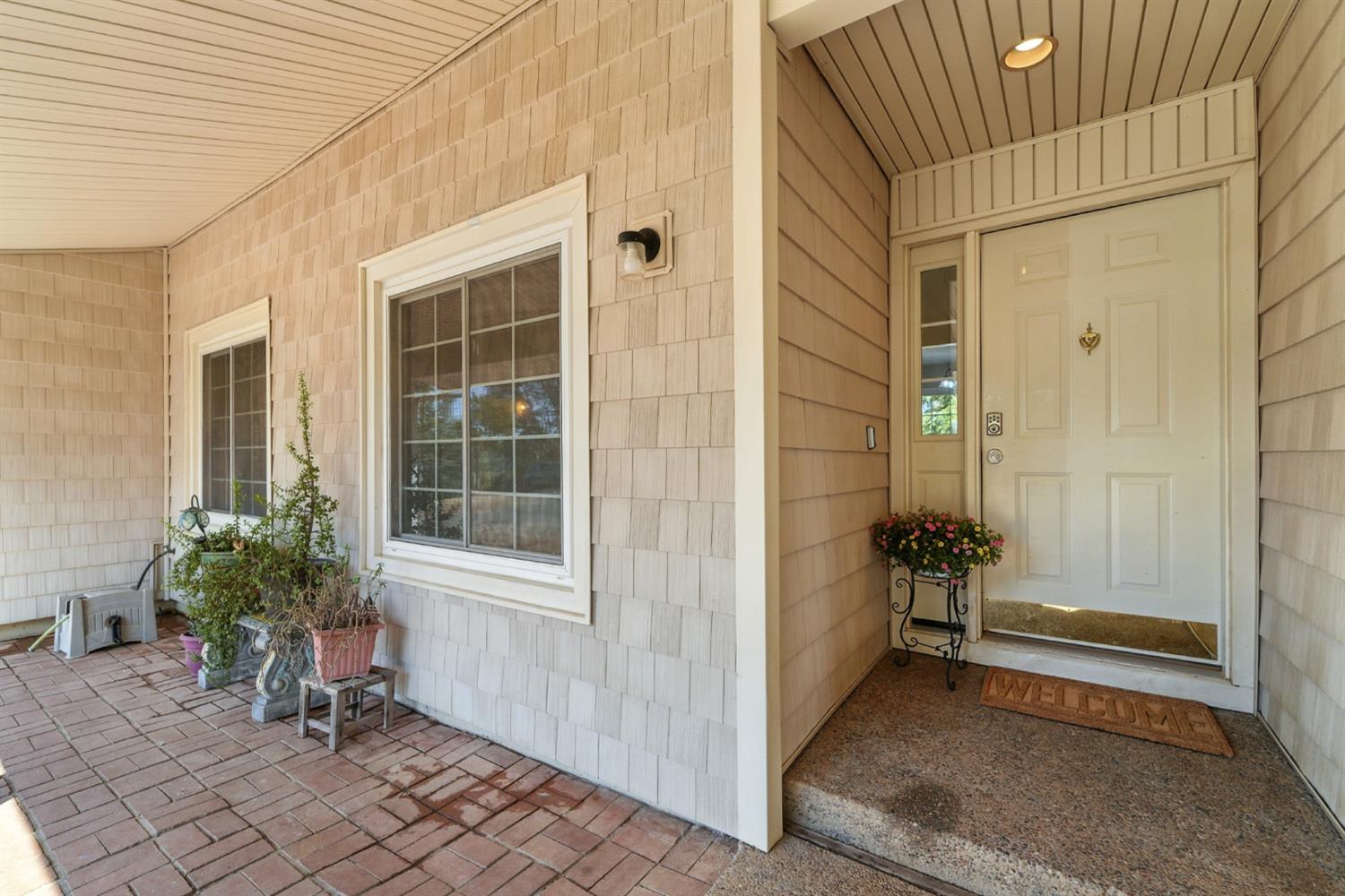 2422 Cheyenne Road Copperopolis, CA 95228 - Photo 5 of 64 a view of a house with a backyard and chair
