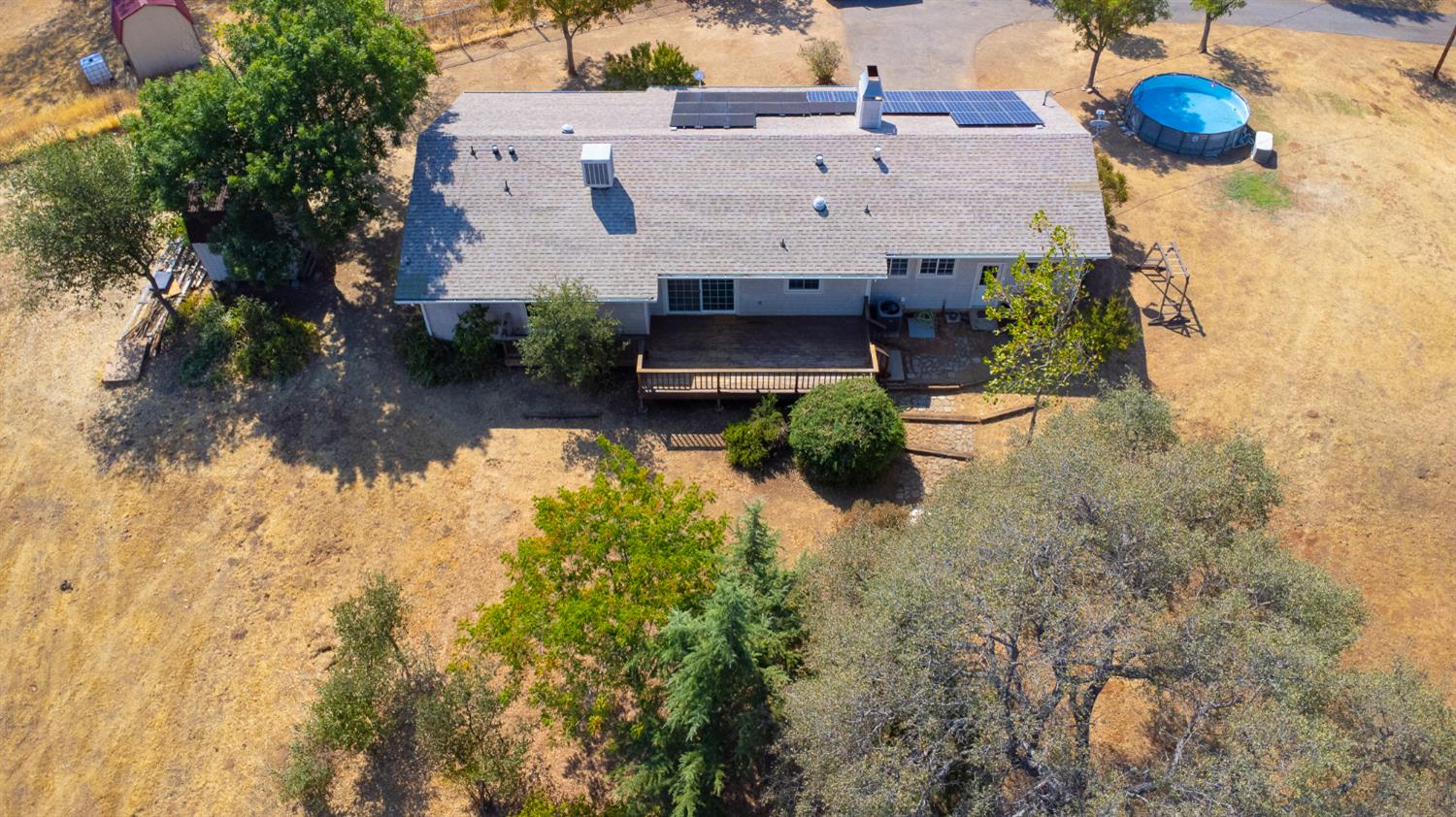 2422 Cheyenne Road Copperopolis, CA 95228 - Photo 56 of 64 a view of a house with a yard and a fountain