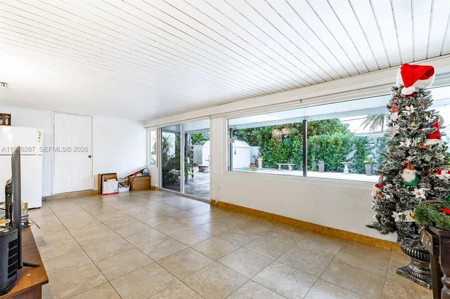 a view of a livingroom with furniture and toys