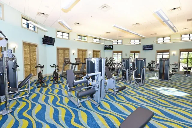 a view of a room with gym equipment