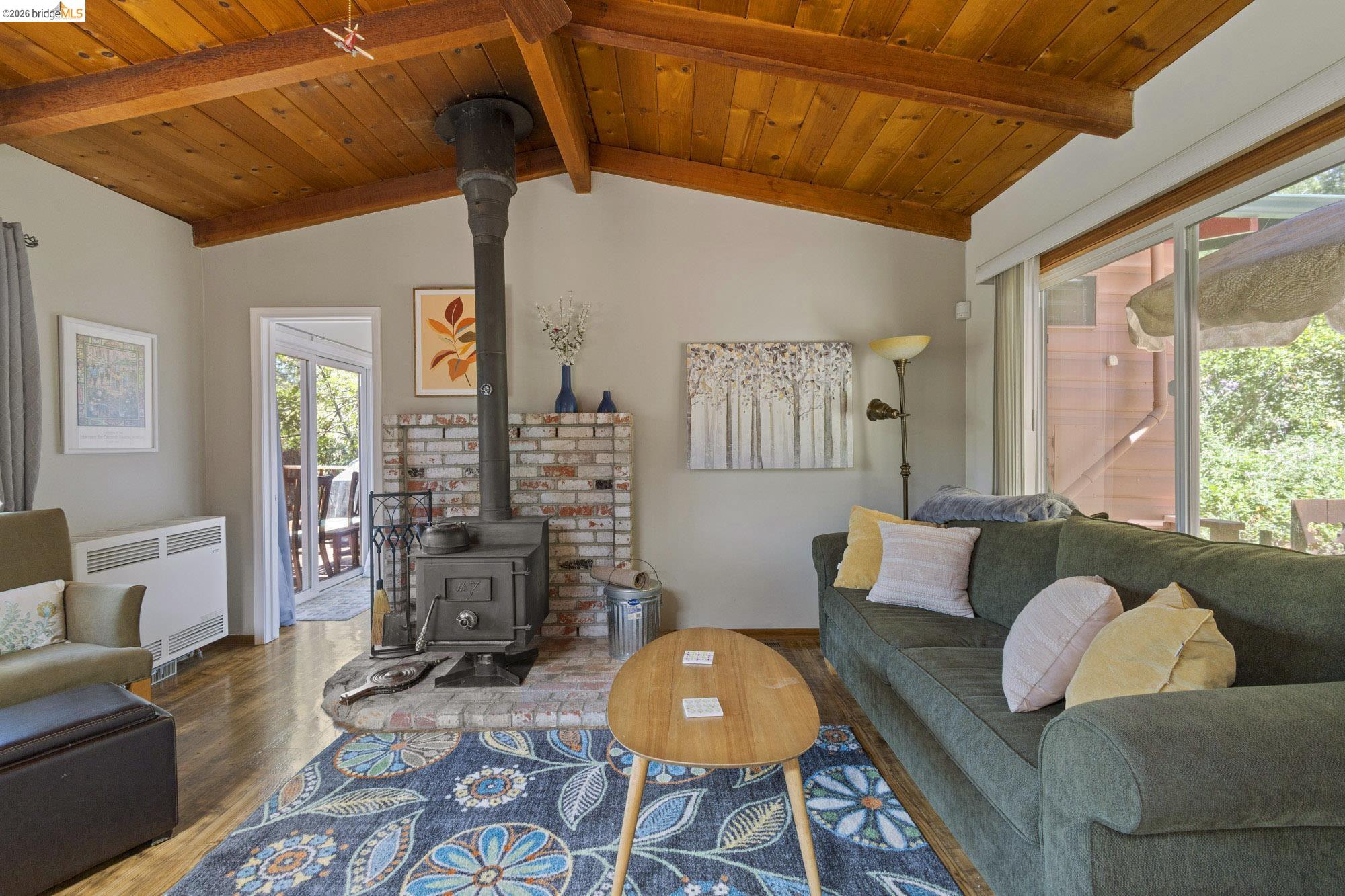 21815 Confidence Road Twain Harte, CA 95383 - Photo 10 of 30 a living room with furniture and wooden floor