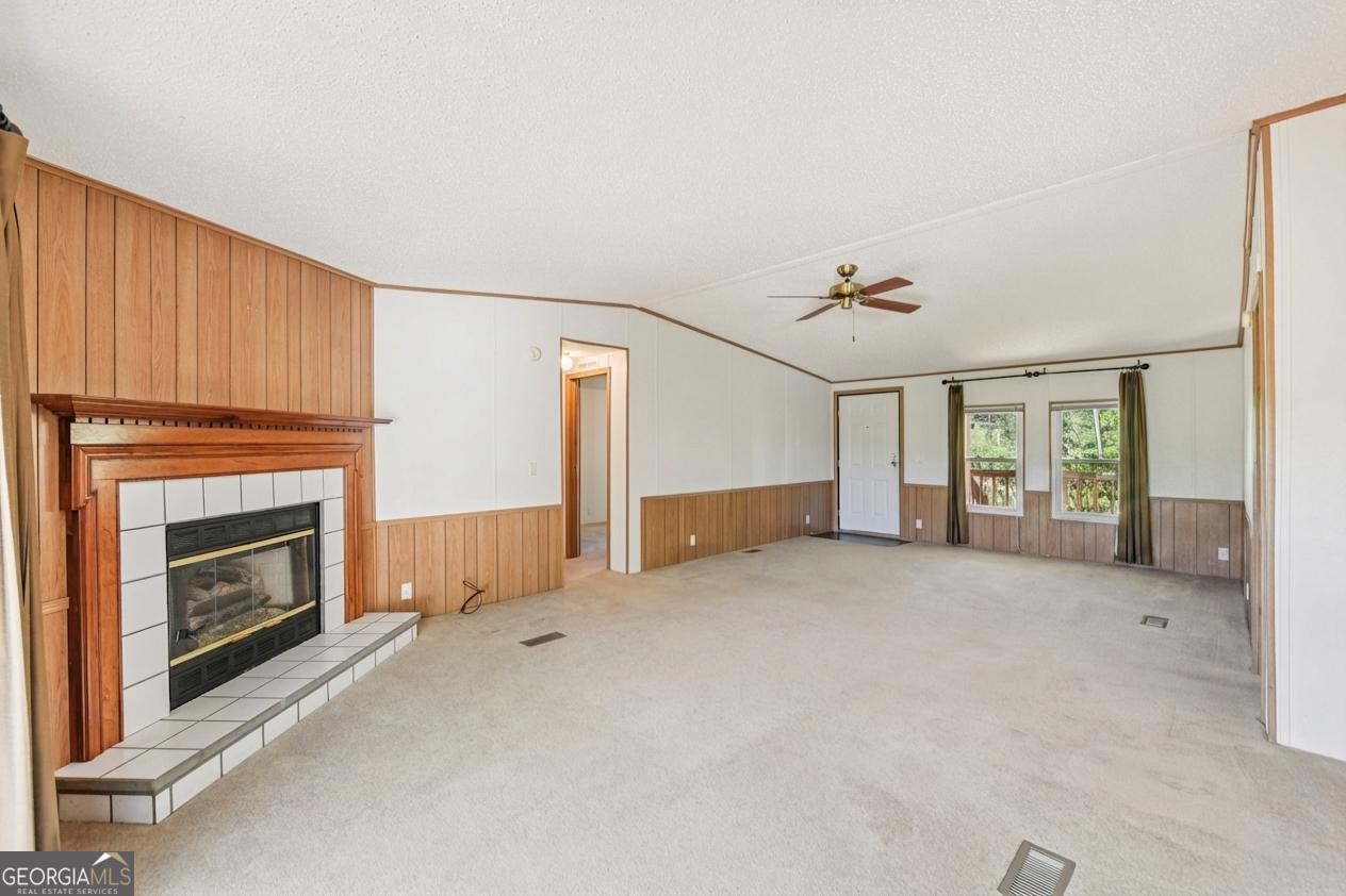 362 Horton Road Dahlonega, GA 30533 - Photo 13 of 57 a view of empty room with a fireplace