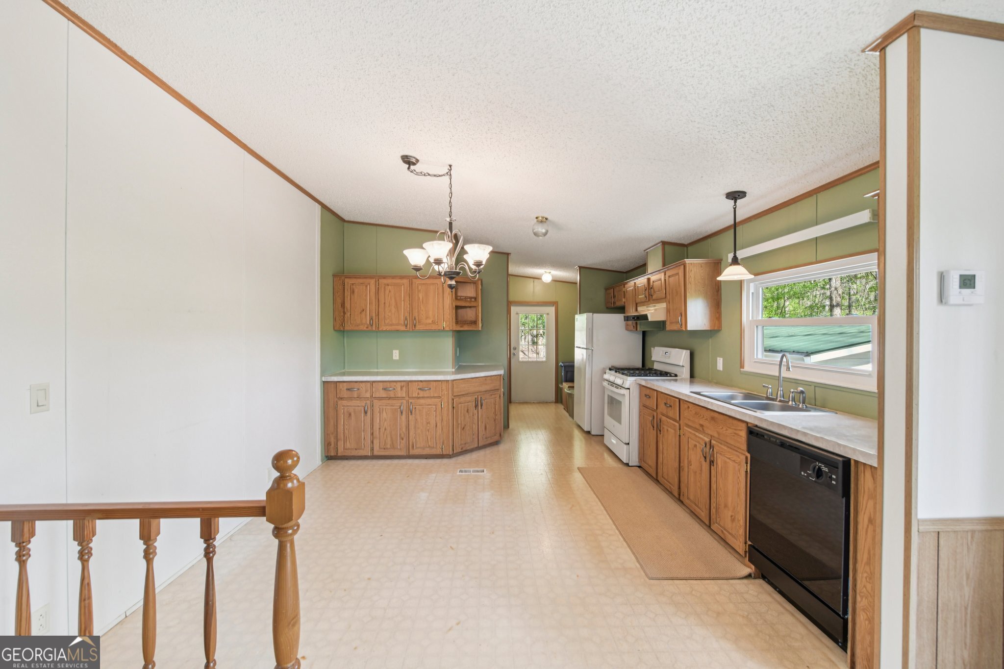 362 Horton Road Dahlonega, GA 30533 - Photo 15 of 57 a large white kitchen with a large window