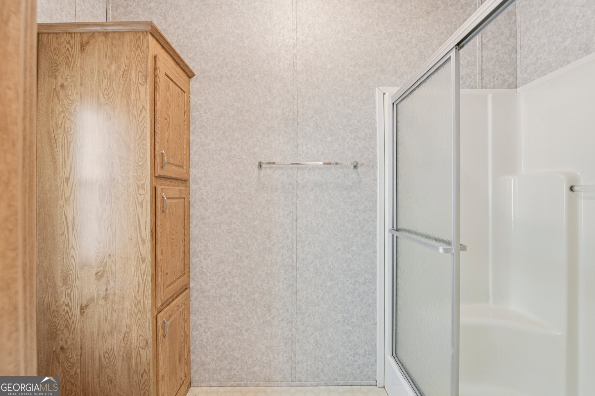 362 Horton Road Dahlonega, GA 30533 - Photo 22 of 57 a bathroom with a shower and a glass door