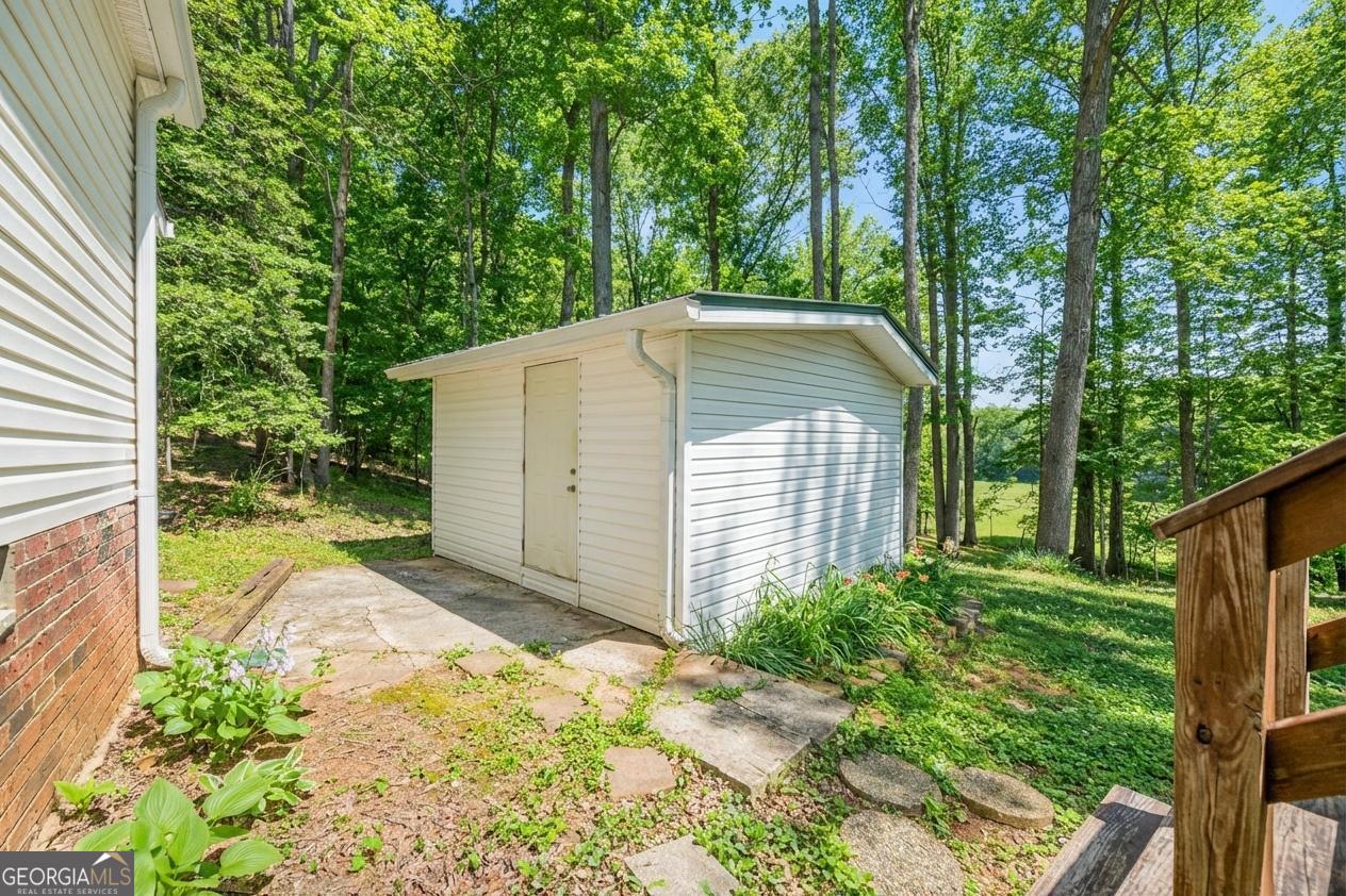 362 Horton Road Dahlonega, GA 30533 - Photo 40 of 57 a view of a backyard with garden