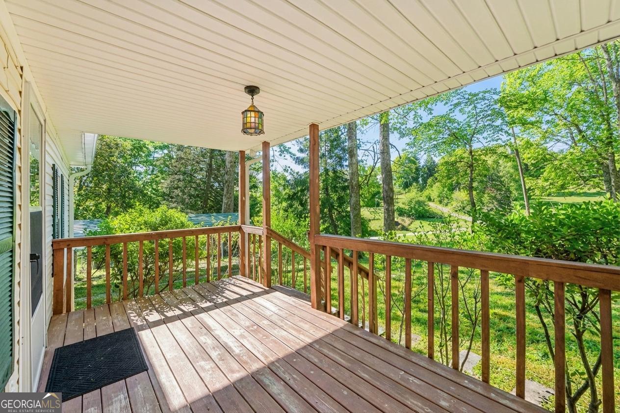 362 Horton Road Dahlonega, GA 30533 - Photo 10 of 57 a view of a balcony with wooden floor