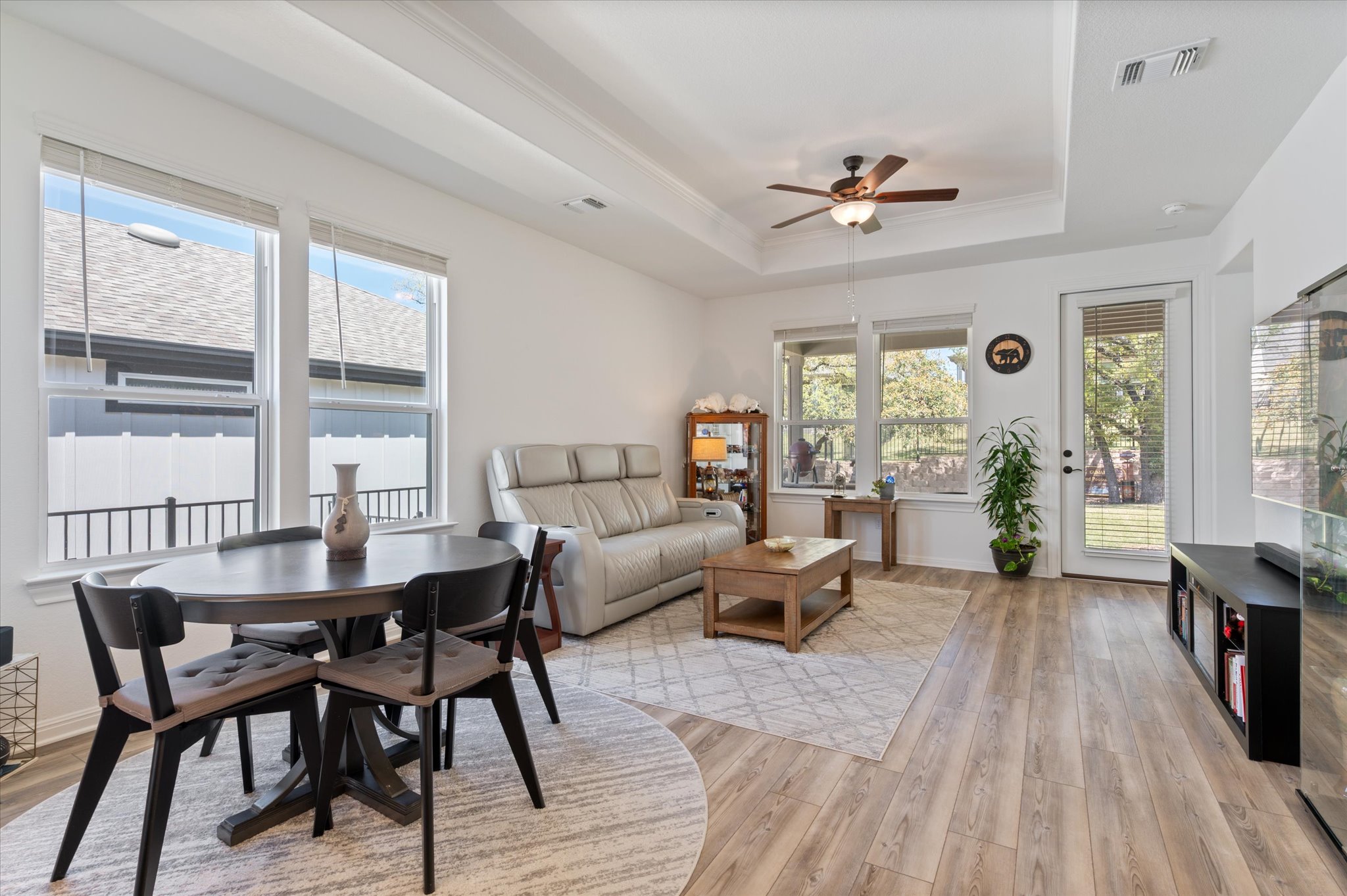 112 Clay Hl Street Georgetown, TX 78633 - Photo 11 of 29 a living room with furniture a wooden floor and a window