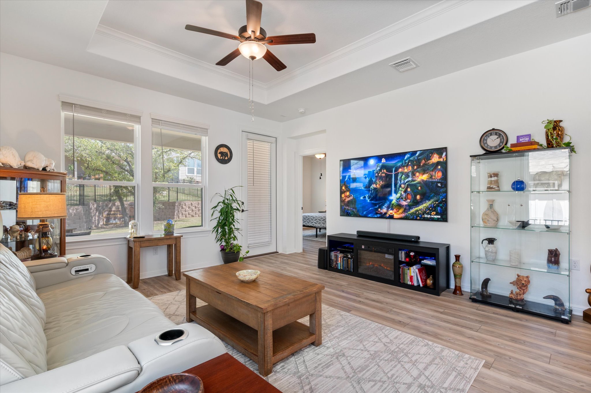 112 Clay Hl Street Georgetown, TX 78633 - Photo 12 of 29 a living room with furniture and a flat screen tv