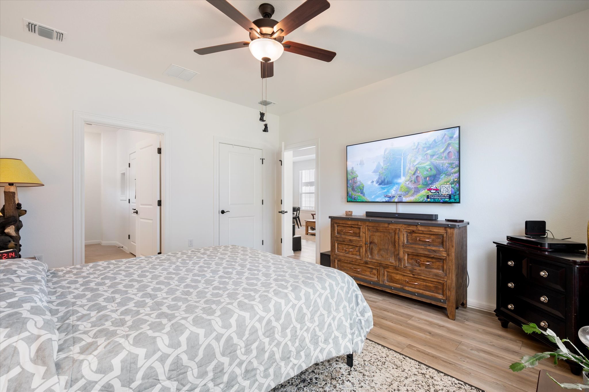 112 Clay Hl Street Georgetown, TX 78633 - Photo 19 of 29 a bedroom with a bed dresser and furniture