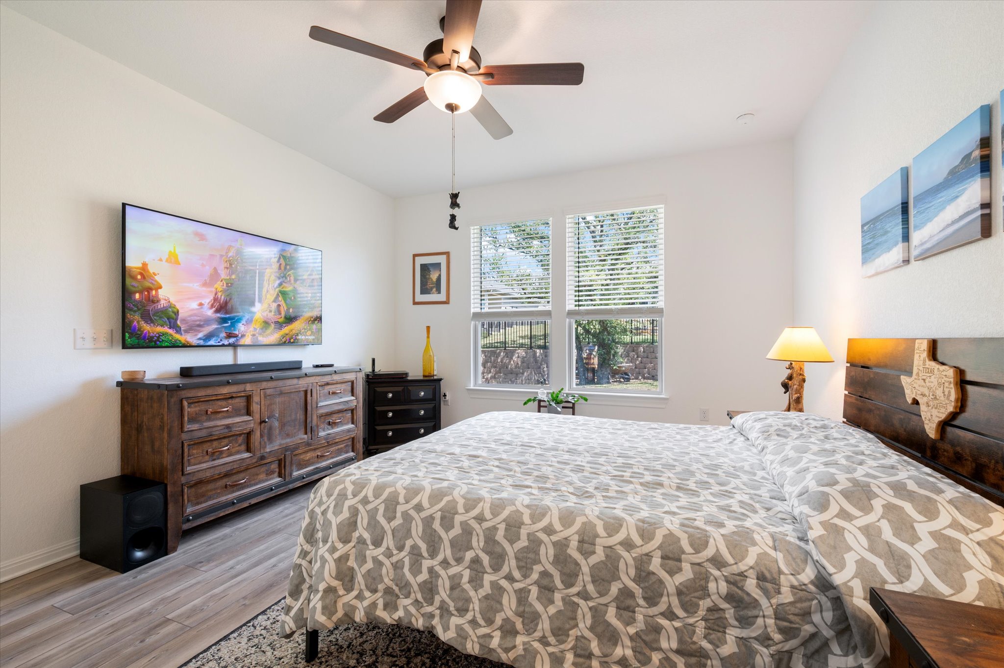 112 Clay Hl Street Georgetown, TX 78633 - Photo 20 of 29 a bedroom with a bed and a flat screen tv