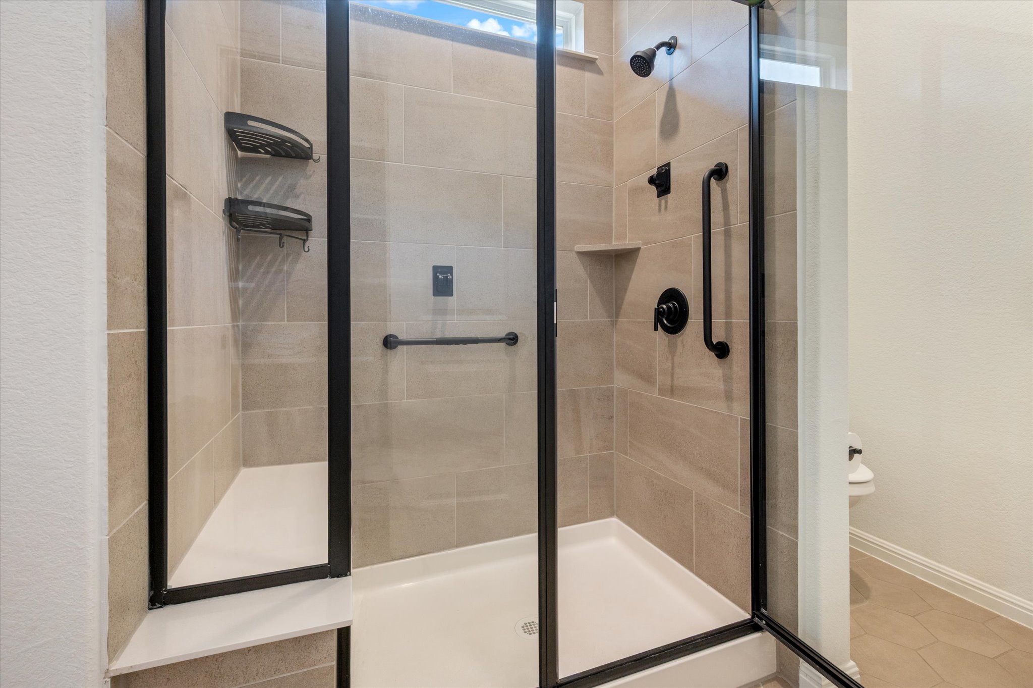 112 Clay Hl Street Georgetown, TX 78633 - Photo 22 of 29 a bathroom with a glass shower door