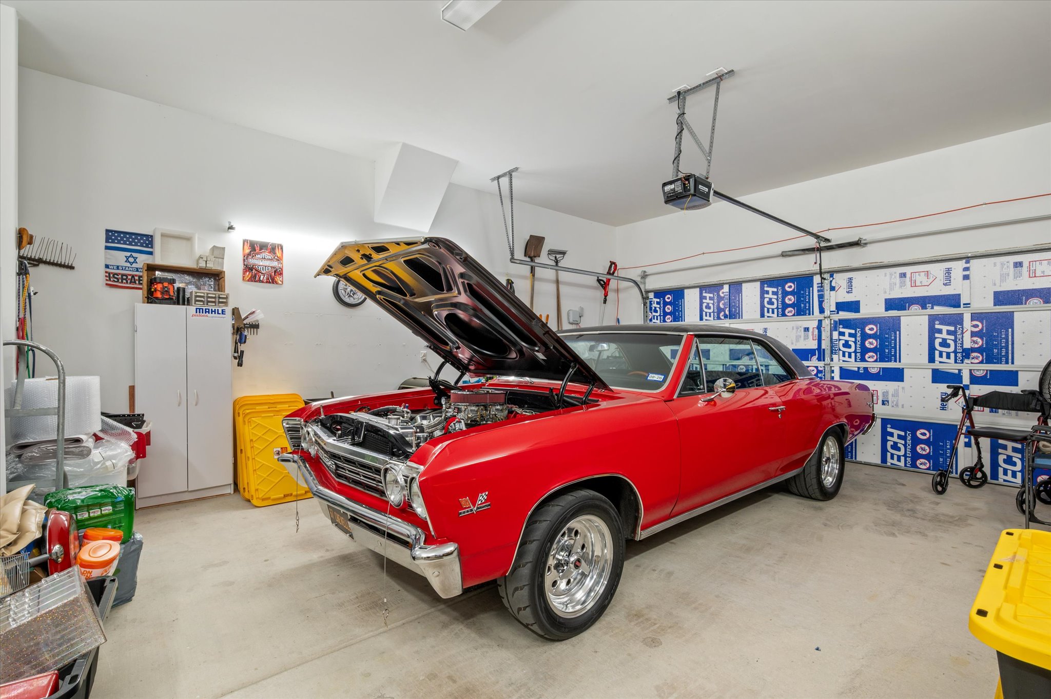 112 Clay Hl Street Georgetown, TX 78633 - Photo 24 of 29 a car parked in a garage