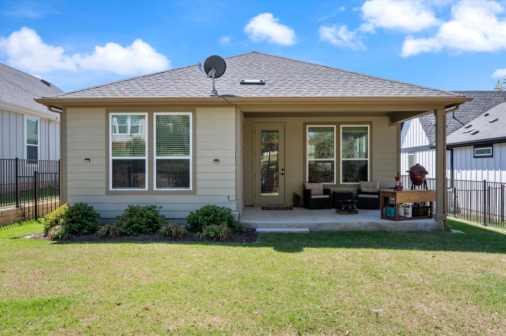 112 Clay Hl Street Georgetown, TX 78633 - Photo 27 of 29 a view of a house with backyard porch and sitting area