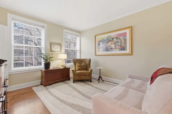 a living room with furniture and window