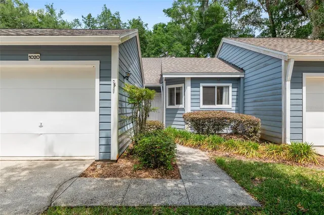 a front view of house with yard