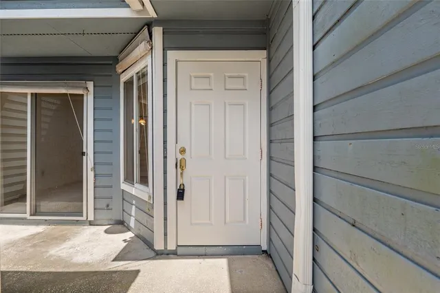 a view of a door house with an empty space
