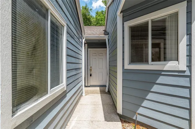 a view of a porch with seating space