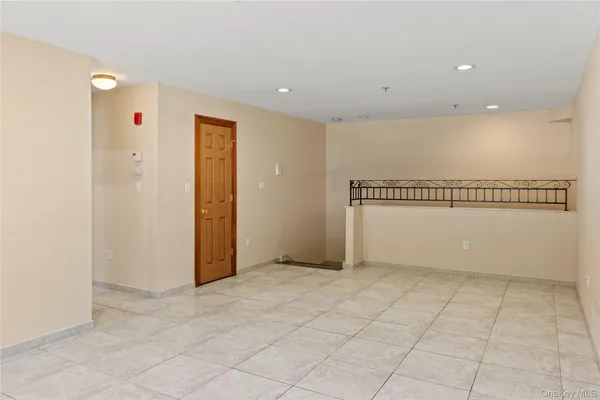 a view of a room with an empty space