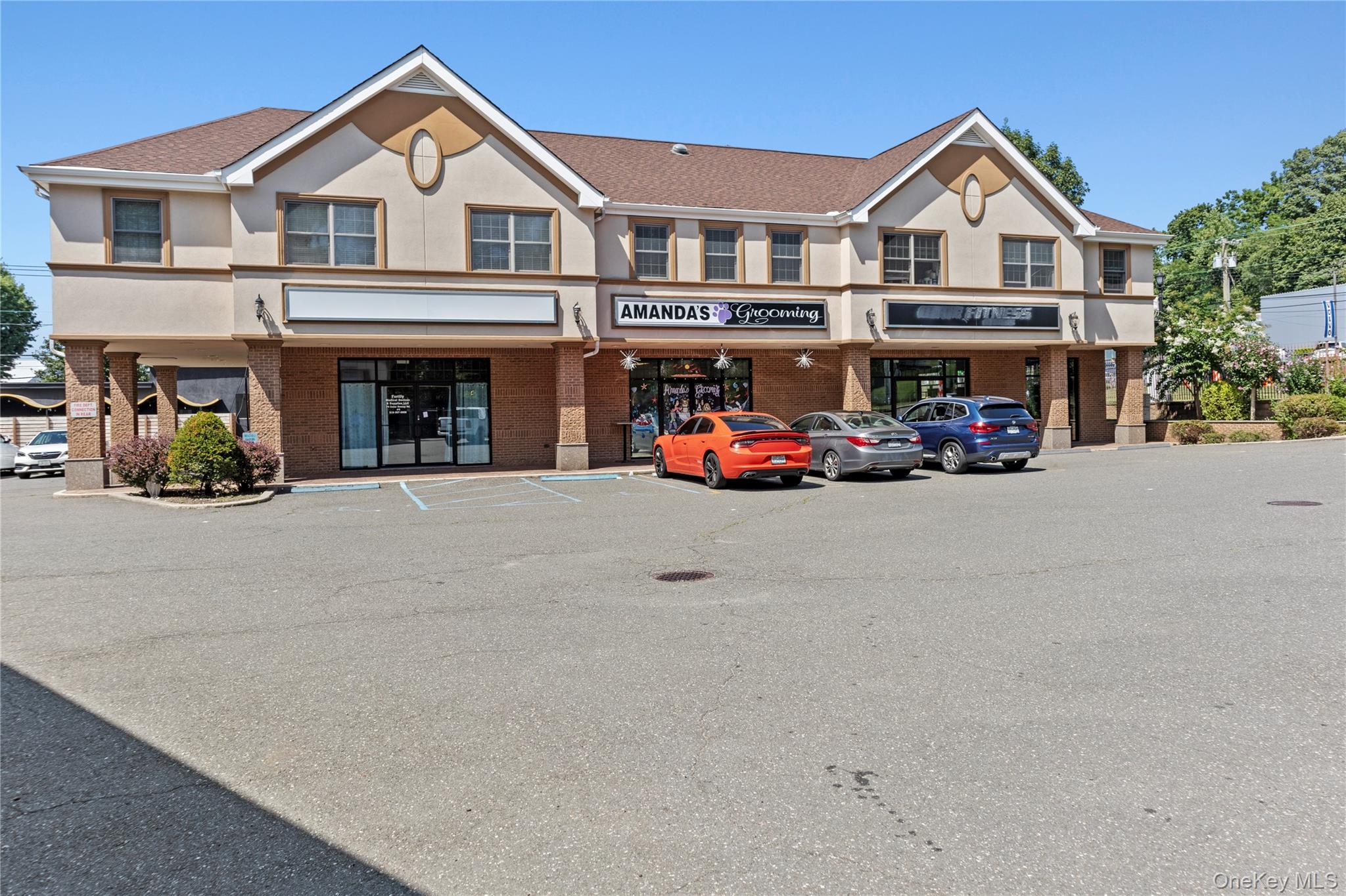 72 Cedar Swamp Road, Unit 3 Glen Cove, NY 11542 - Photo 10 of 10 a view of a car park in front of house