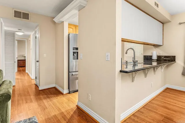 a view of a living room with a bed
