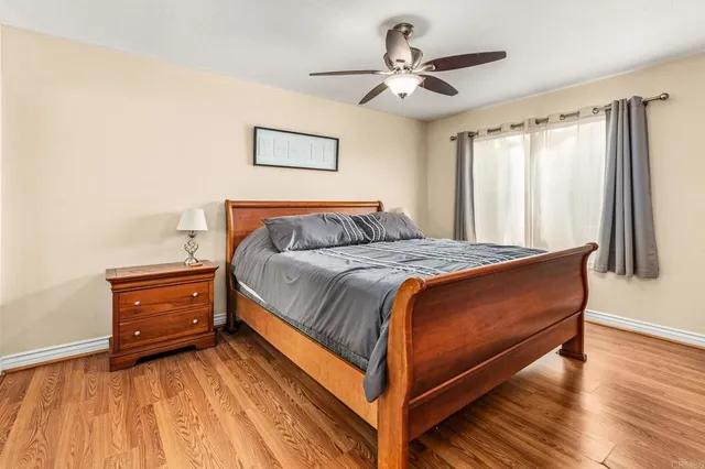 a bed room with a bed and a window