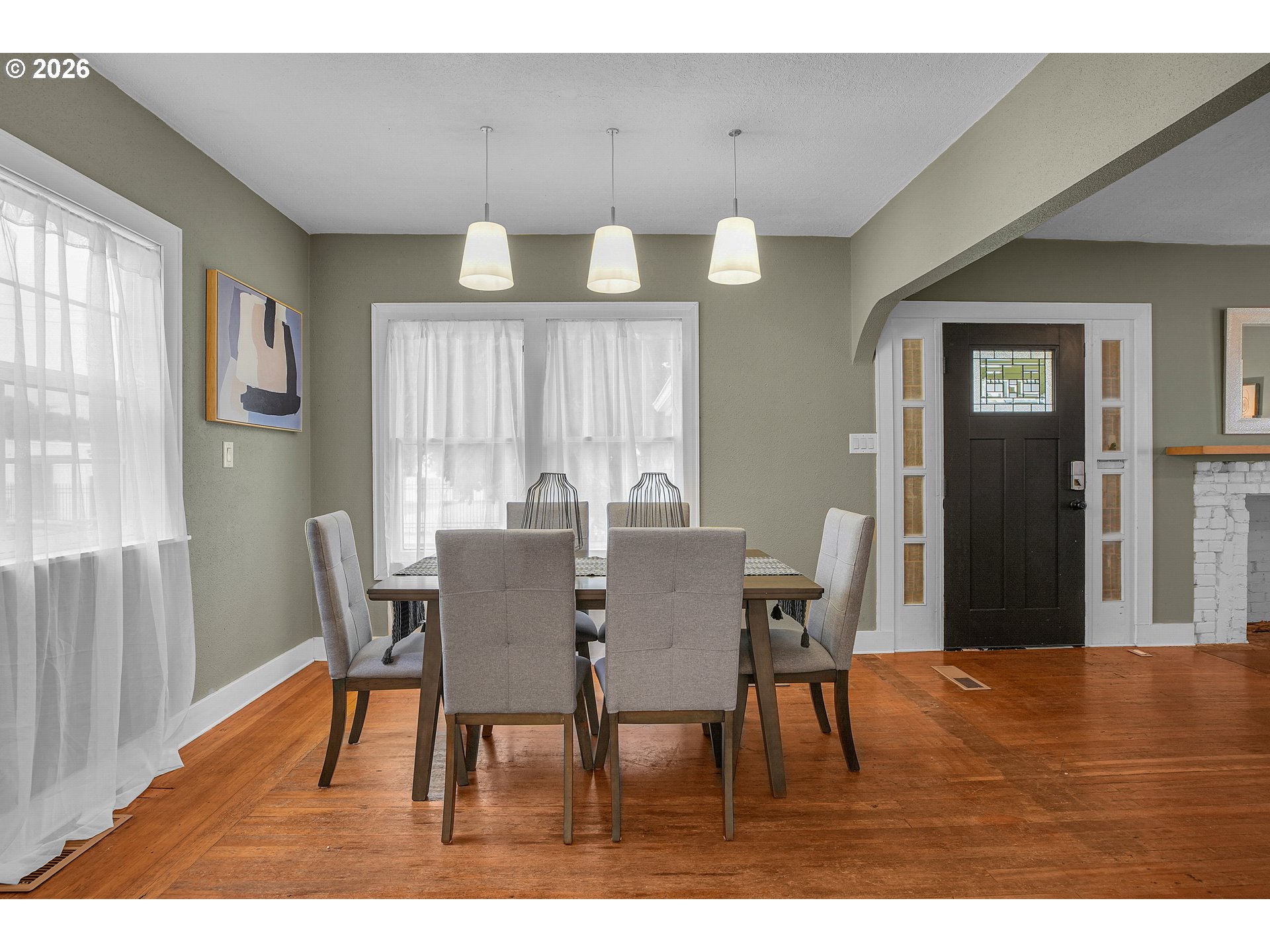 140 21st Street Northeast Salem, OR 97301 - Photo 12 of 44 a view of a dining room with furniture and wooden floor