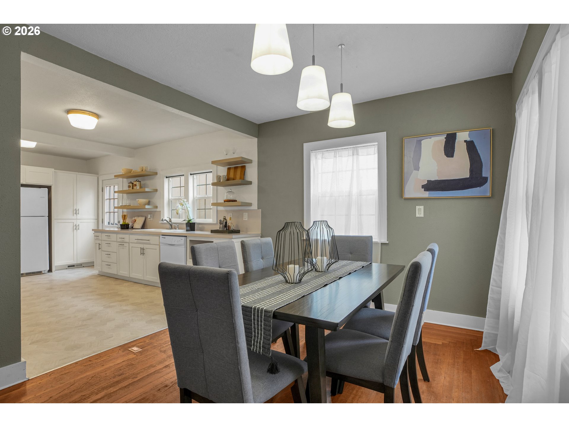 140 21st Street Northeast Salem, OR 97301 - Photo 13 of 44 a view of a dining room with furniture and wooden floor