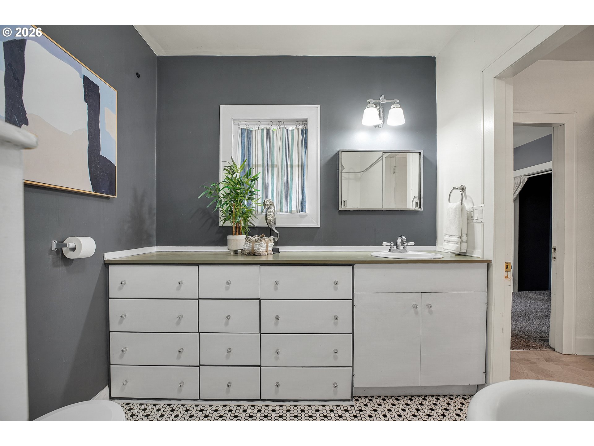 140 21st Street Northeast Salem, OR 97301 - Photo 25 of 44 a bathroom with a sink and a mirror