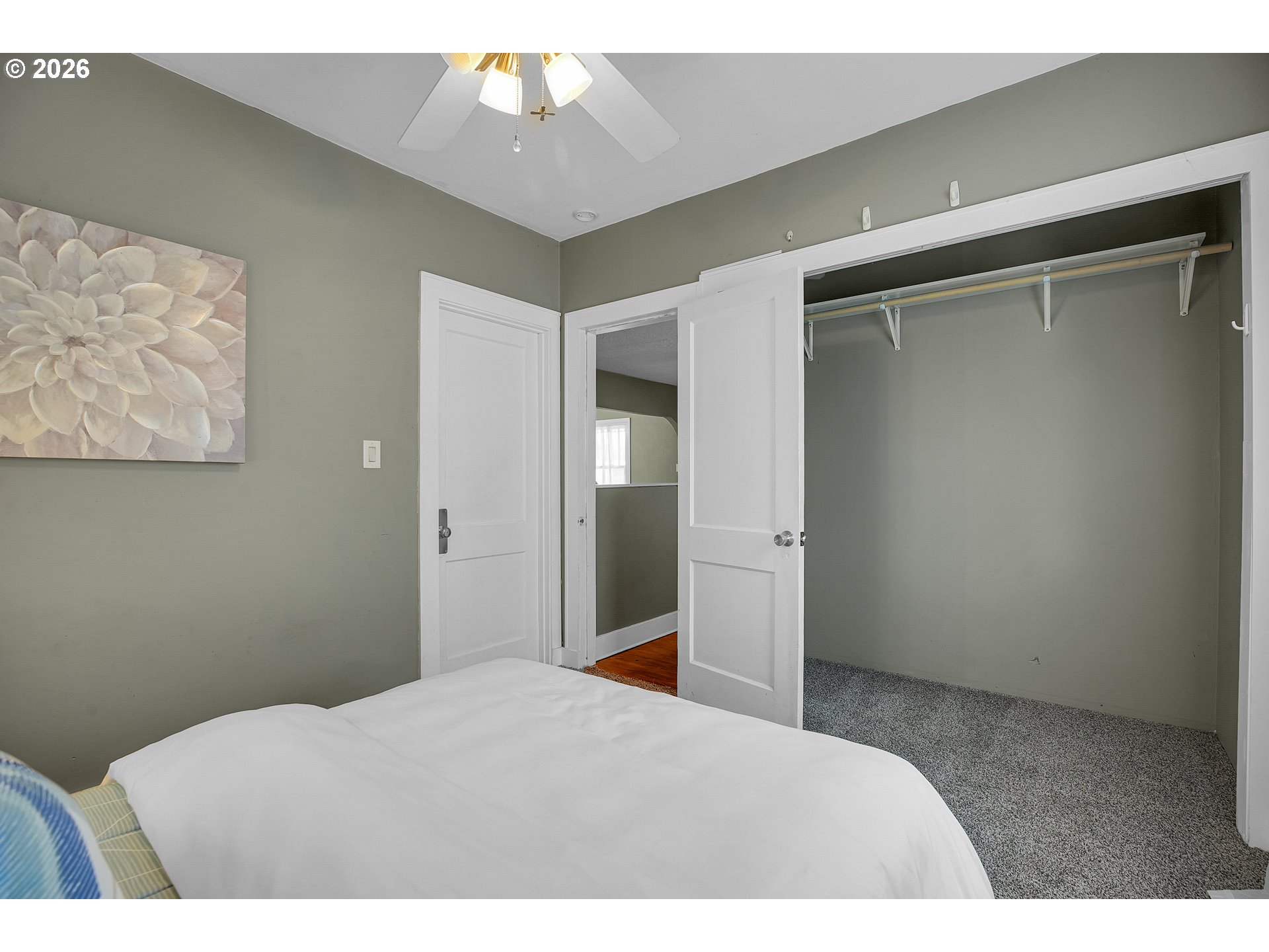 140 21st Street Northeast Salem, OR 97301 - Photo 29 of 44 a bedroom with a bed and a painting on the wall