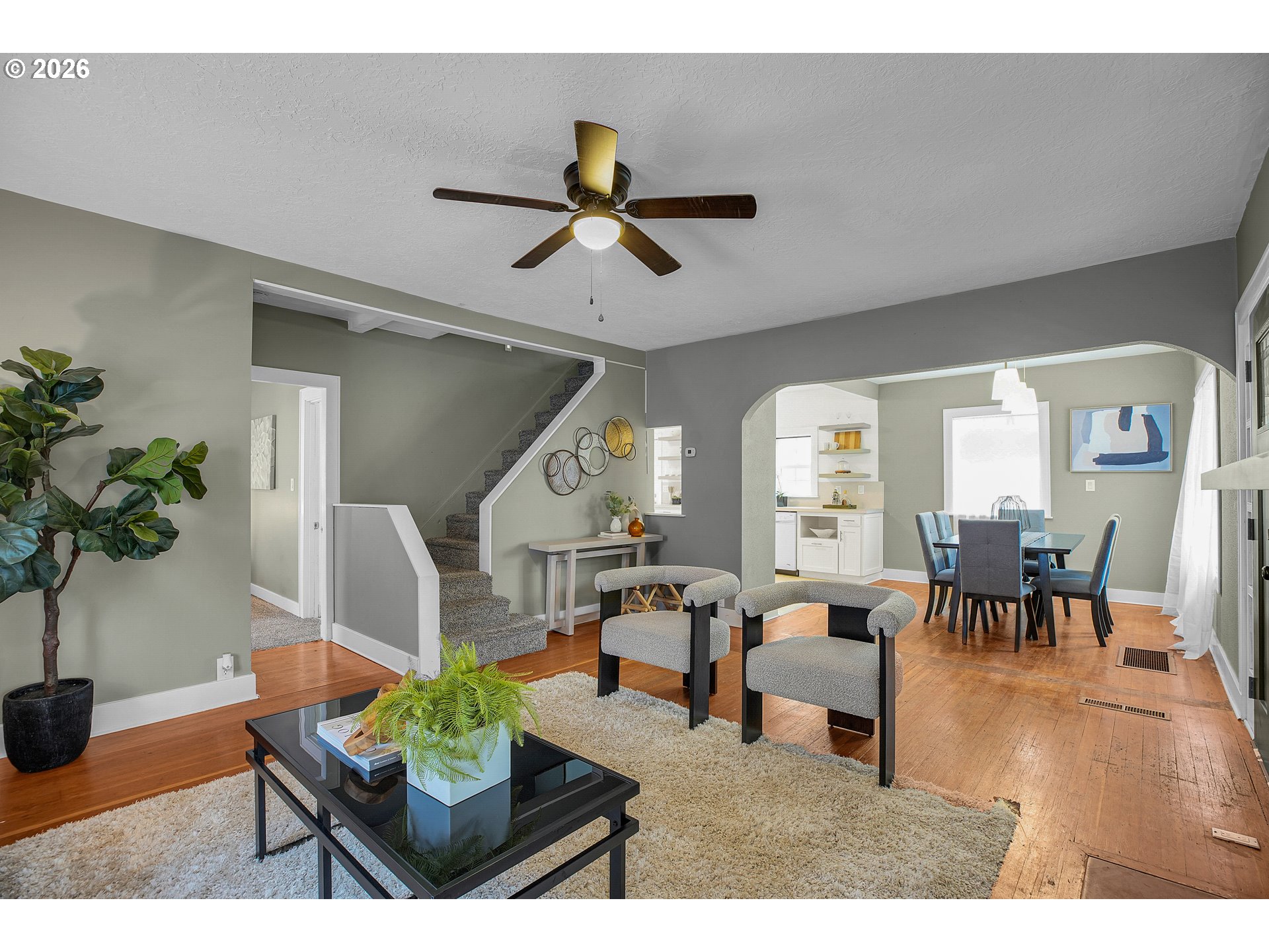 140 21st Street Northeast Salem, OR 97301 - Photo 10 of 44 a living room with furniture and a potted plant
