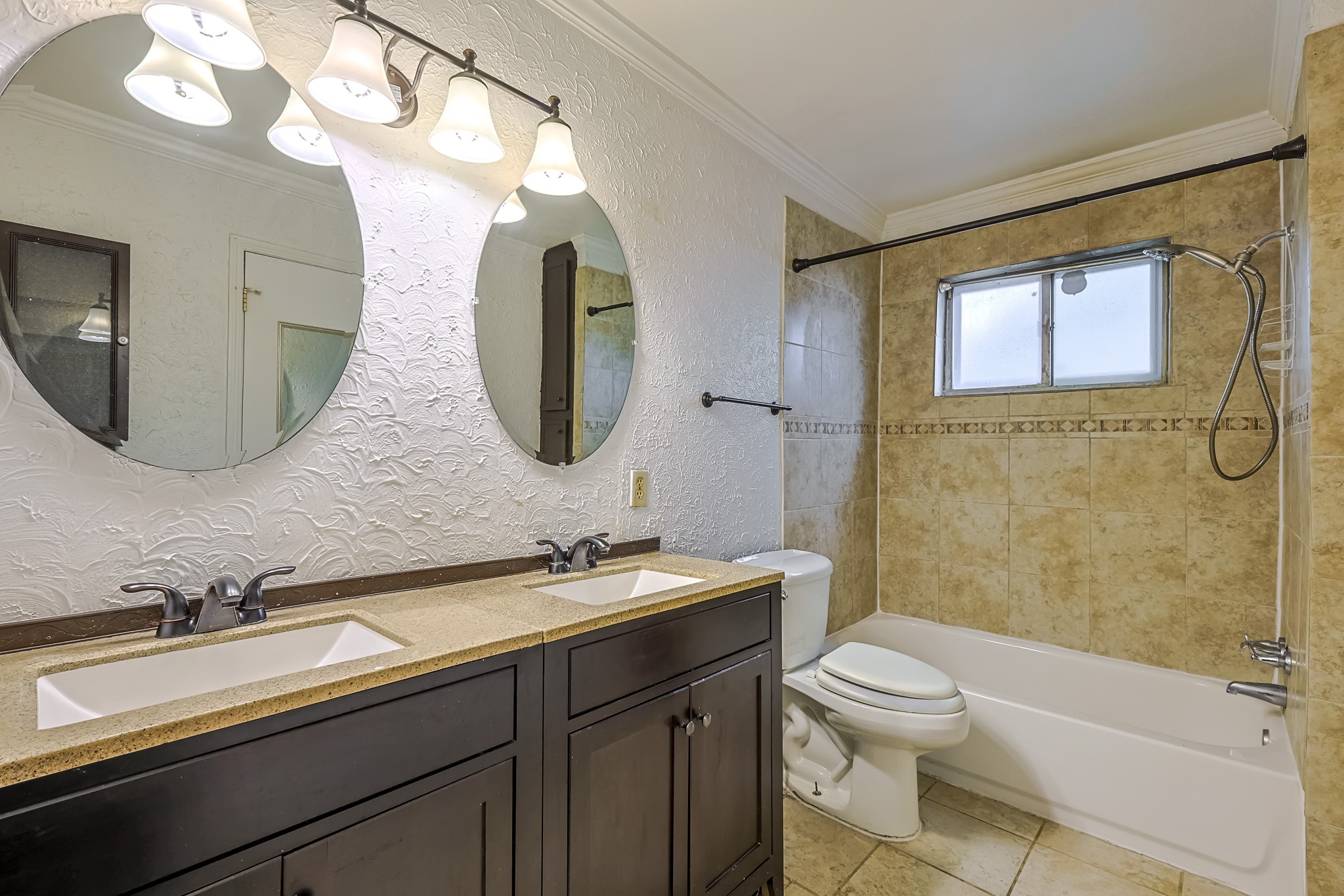 23126 Bayleaf Drive Spring, TX 77373 - Photo 22 of 43 a bathroom with a double vanity sink mirror and toilet