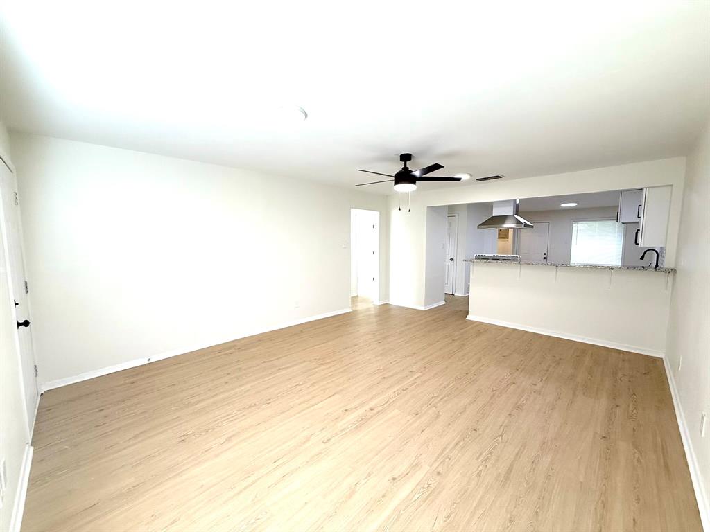 1401 Arvel Circle Azle, TX 76020 - Photo 16 of 26 a view of empty room with wooden floor
