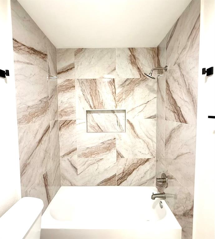 1401 Arvel Circle Azle, TX 76020 - Photo 18 of 26 a bathroom with a sink mirror vanity and shower