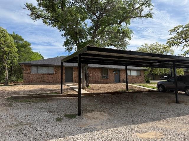 1401 Arvel Circle Azle, TX 76020 - Photo 26 of 26 a view of house with backyard and trees