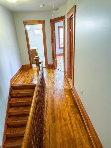 a view of entryway with wooden floor