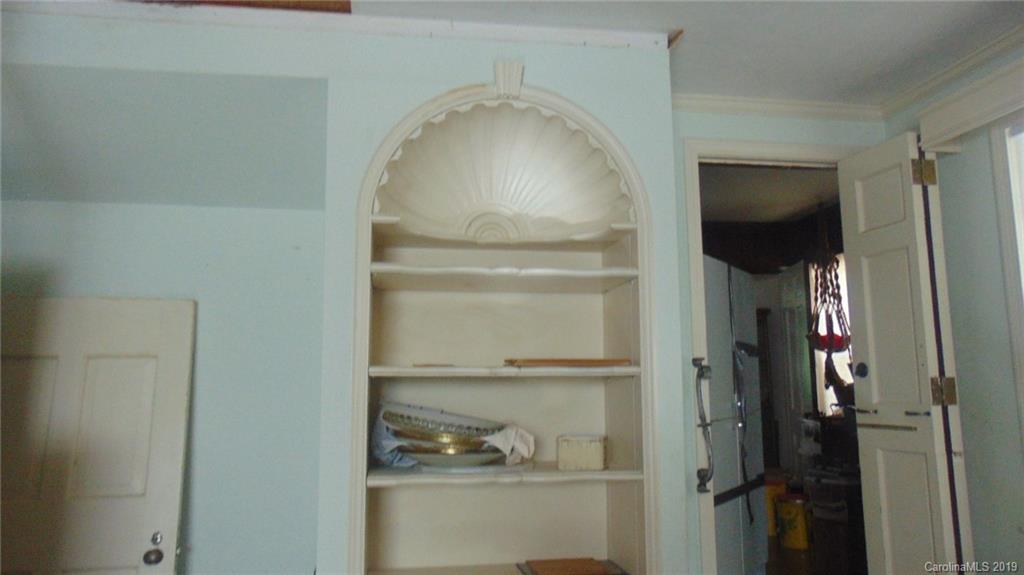 3516 Brevard Road Hendersonville, NC 28791 - Photo 13 of 20 a view of a hallway with entryway and wooden floor