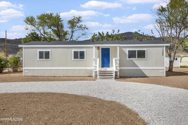 front view of a house with a street