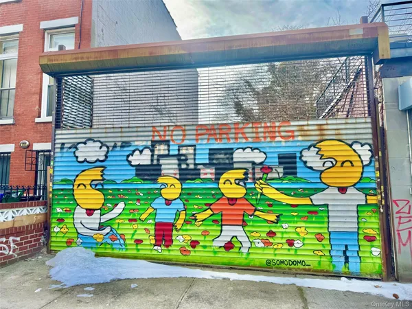 an aerial view of a house with swimming pool and outdoor space