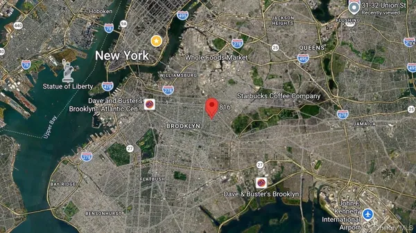 an aerial view of a house with wooden floor