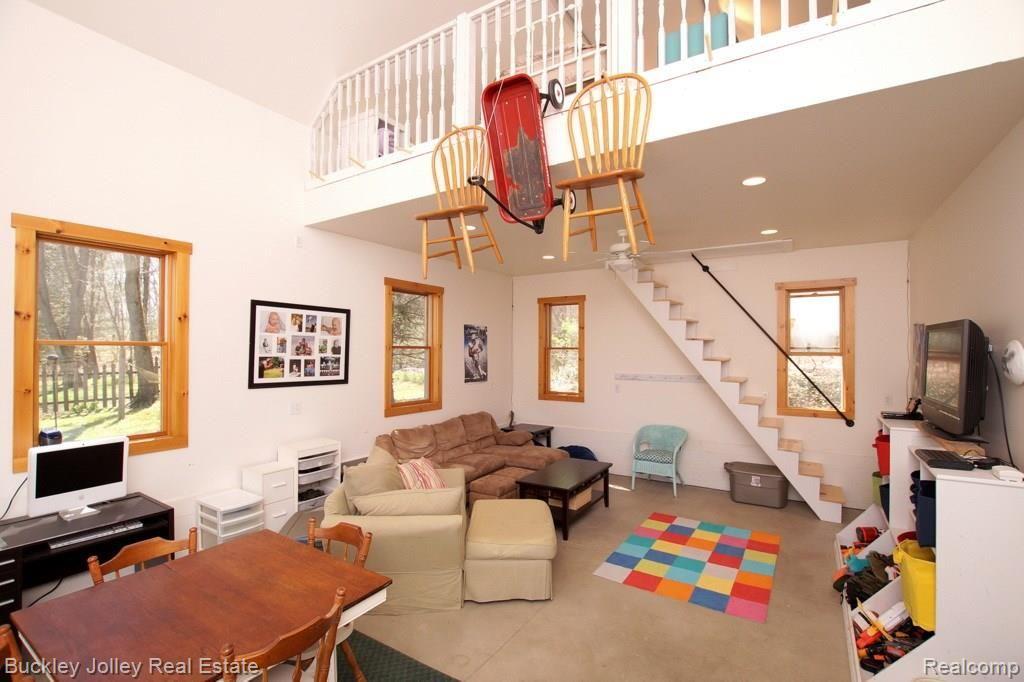 1278 County Farm Road Howell, MI 48843 - Photo 22 of 28 Large Family Room in Barn