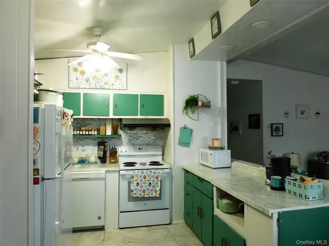 a room with a sink and cabinets