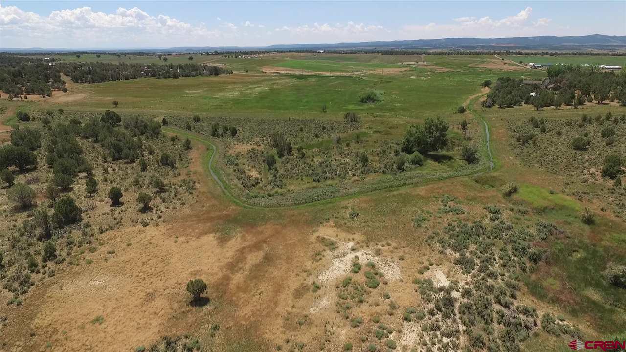 3805 County Road 510 Durango, CO 81303 - Photo 12 of 19 a view of a lake with a mountain