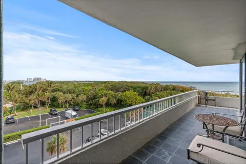 a view of a balcony with city view