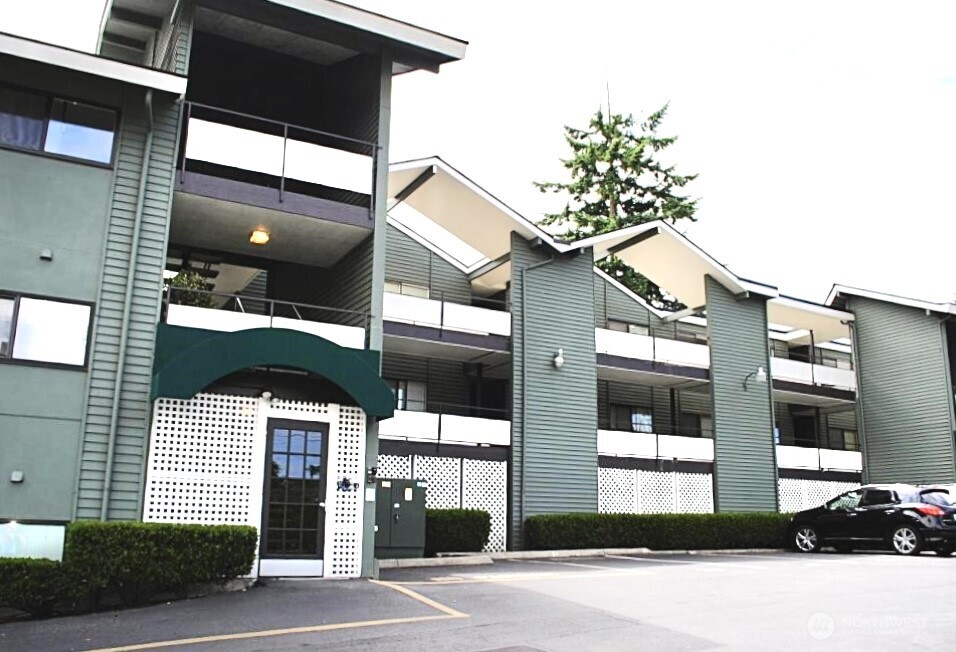 7924 212th Street Southwest, Unit 211 Edmonds, WA 98026 - Photo 14 of 14 a view of a building with a street