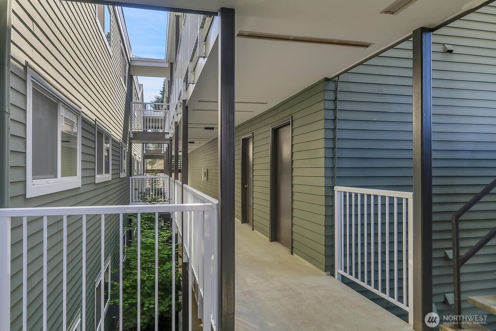 7924 212th Street Southwest, Unit 211 Edmonds, WA 98026 - Photo 3 of 14 a view of a balcony
